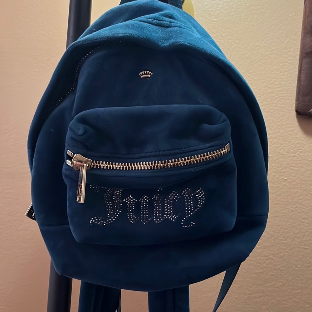 Makeup marks on the inside , in perfect condition otherwise. Soft material